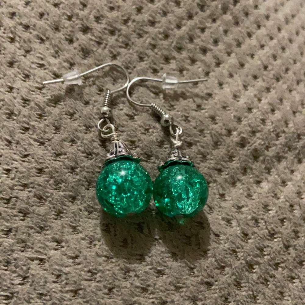 Green glass in silver and made balls